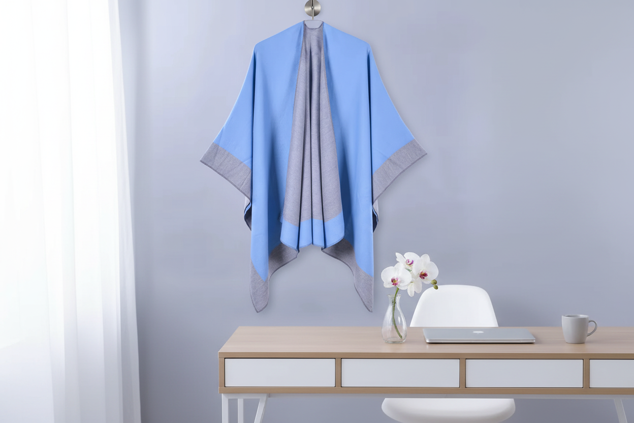 Blue cape hanging in office with flower
